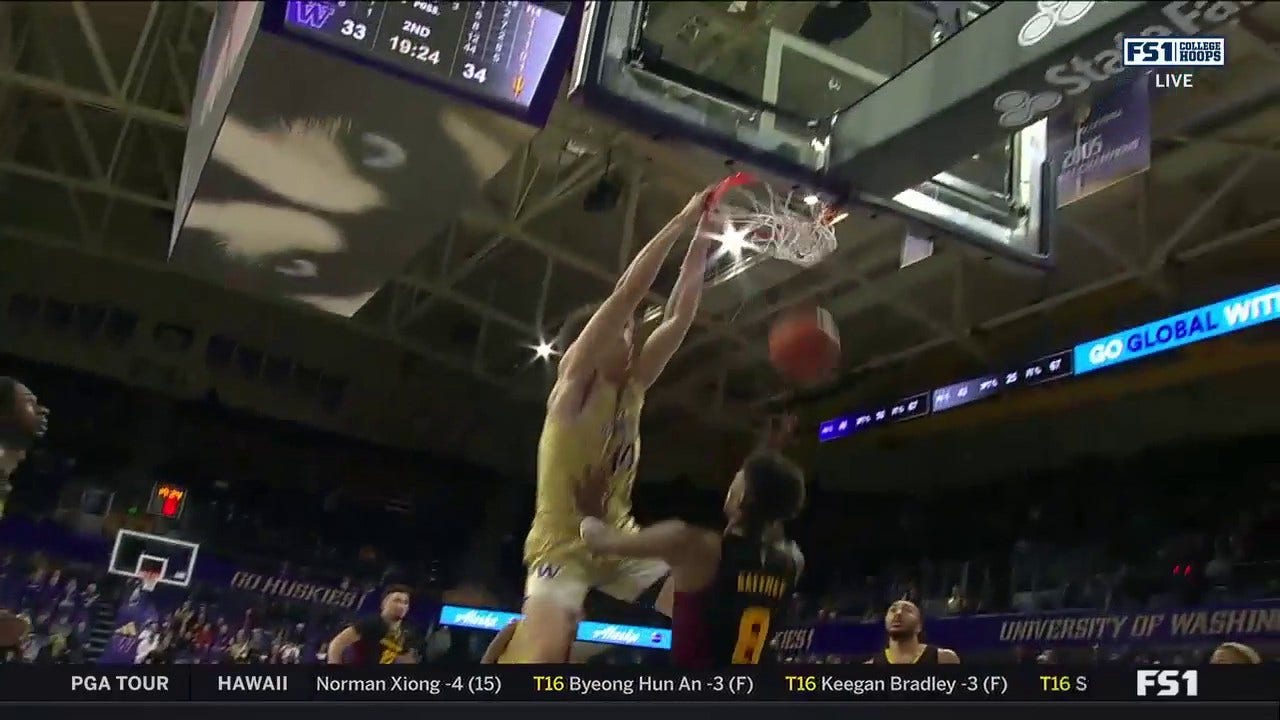 Braxton Meah goes vertical for the two-handed slam to help Washington take the lead over Arizona State