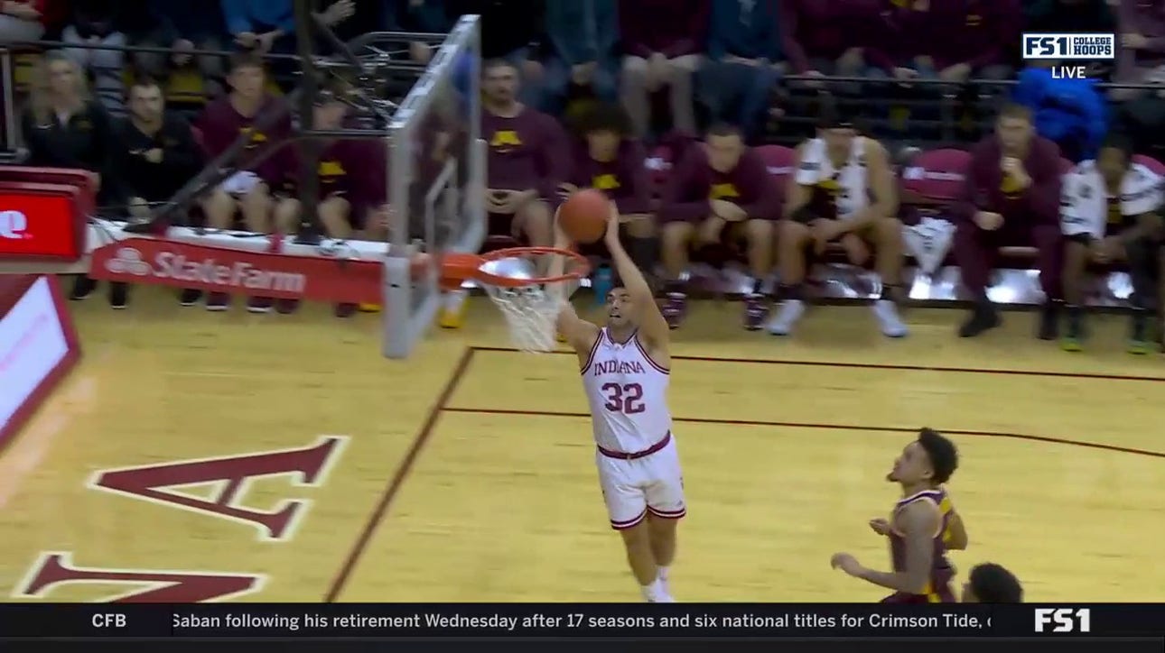 Trey Galloway intercepts a pass and finishes a high-flying alley-oop to extend Indiana's lead over Minnesota