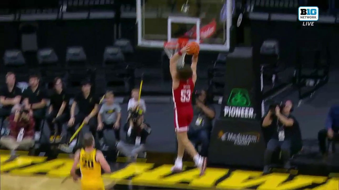 Nebraska's Josiah Allick takes it coast-to-coast for a two-handed slam that shrinks Iowa's lead