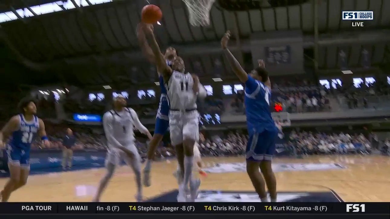 Seton Hall's Dre Davis makes a dominant block to keep the lead against Butler