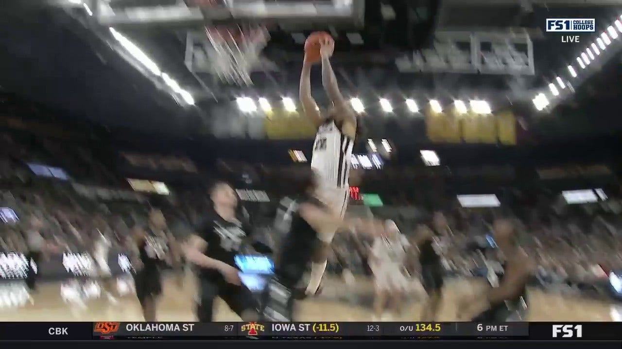 Providence's Devin Carter throws down the two-handed dunk to increase the lead over Xavier