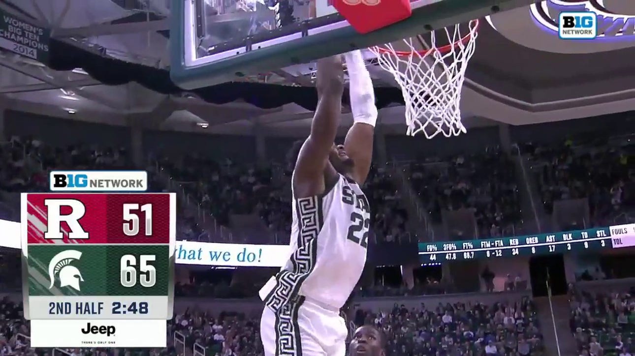 Mady Sissoko throws down a powerful two-handed slam to extend Michigan State's lead against Rutgers