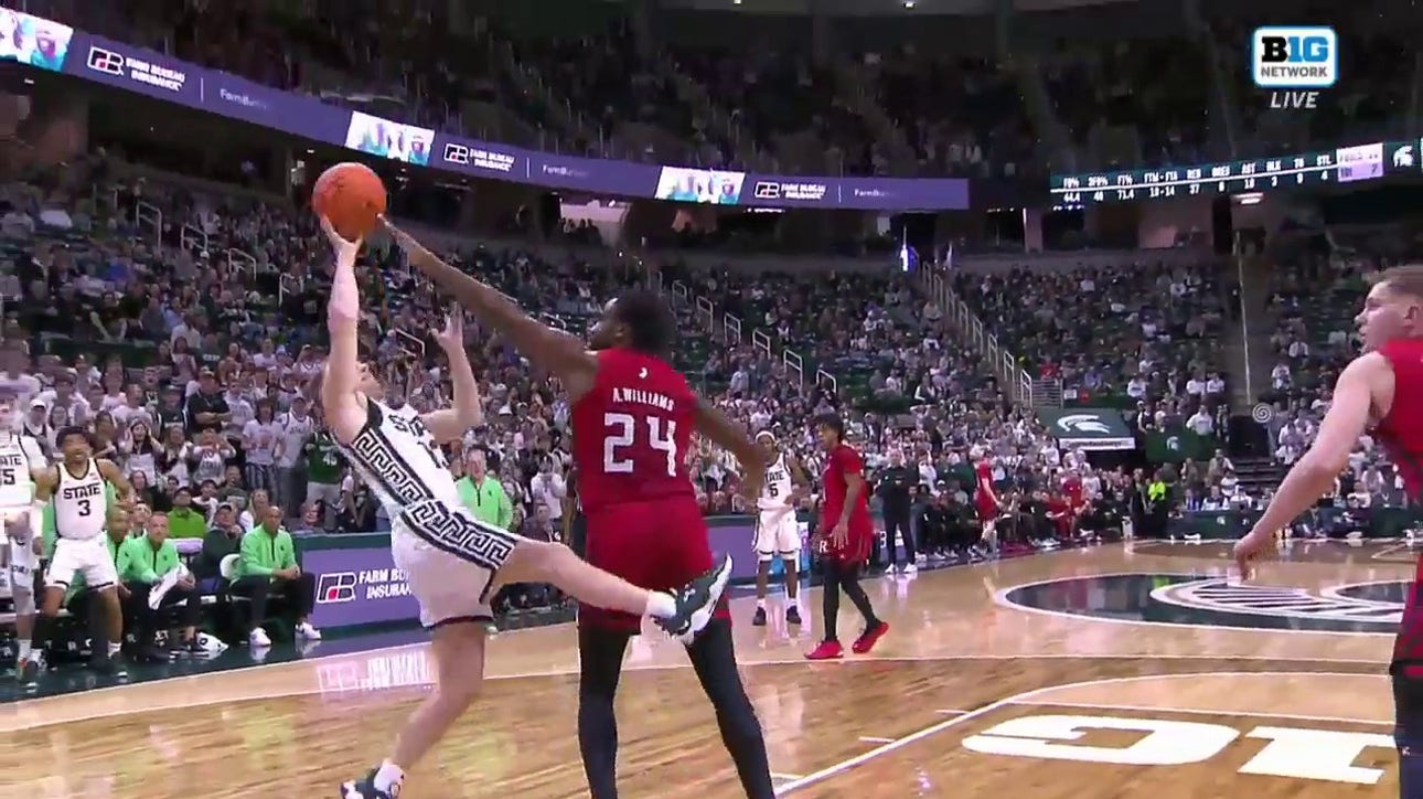 Steven Izzo, son of Tom, scores his first field goal with a strong and-1 finish in Michigan State’s 73-55 win over Rutgers
