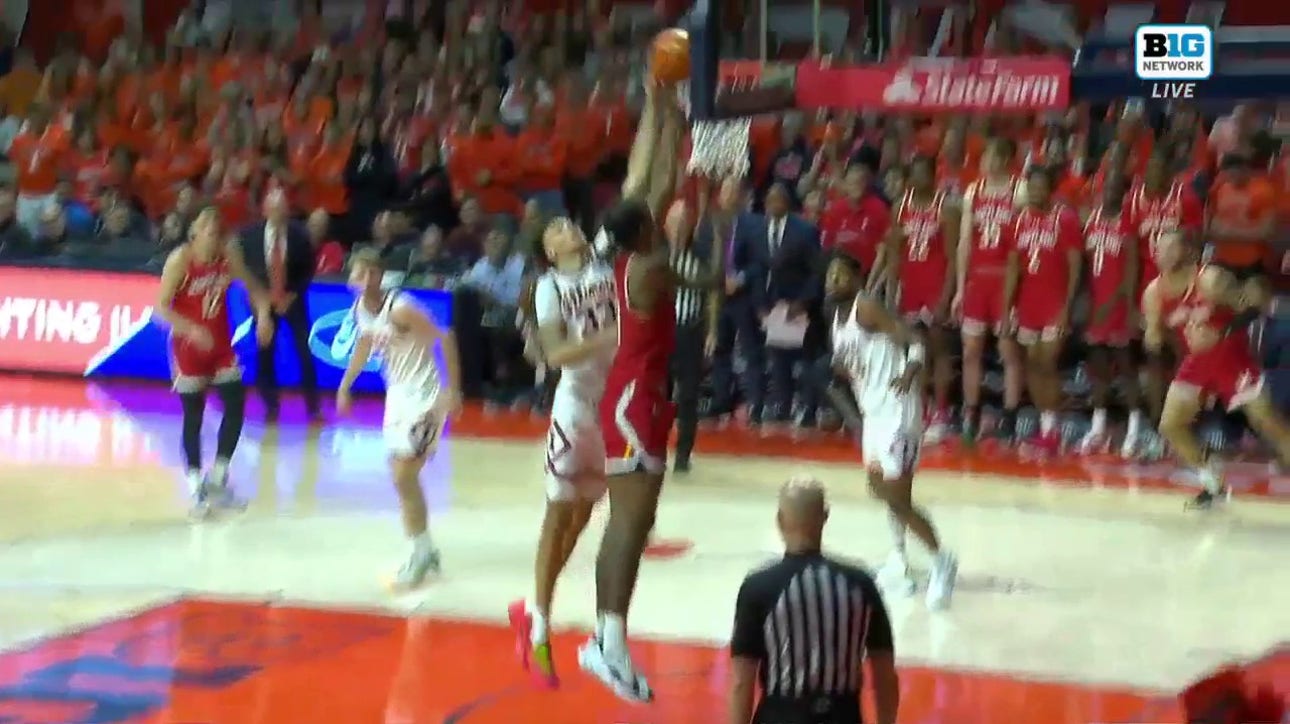 Illinois' Coleman Hawkins gets a block then finishes an and-1 layup to shrink Maryland's lead 