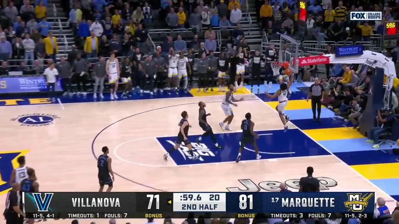 Stevie Mitchell goes up and throws down a WILD jam to seal Marquette's victory over Villanova