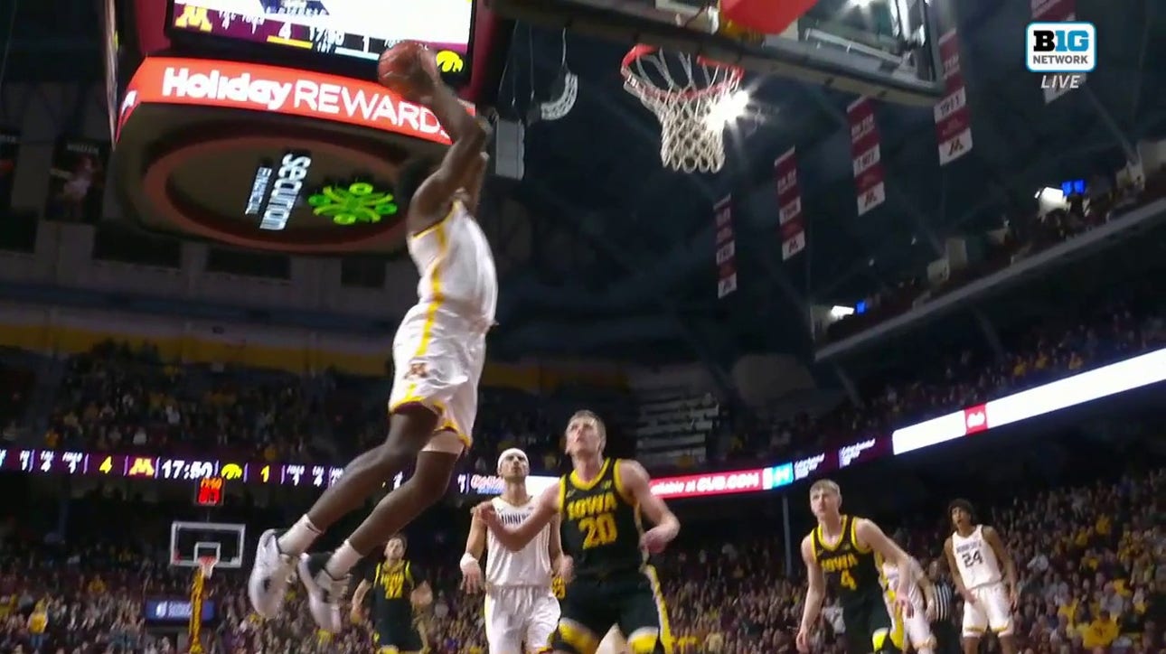 Minnesota's Joshua Ola-Joseph delivers a wicked alley-oop dunk on the pass from Elijah Hawkins to increase the lead over Iowa