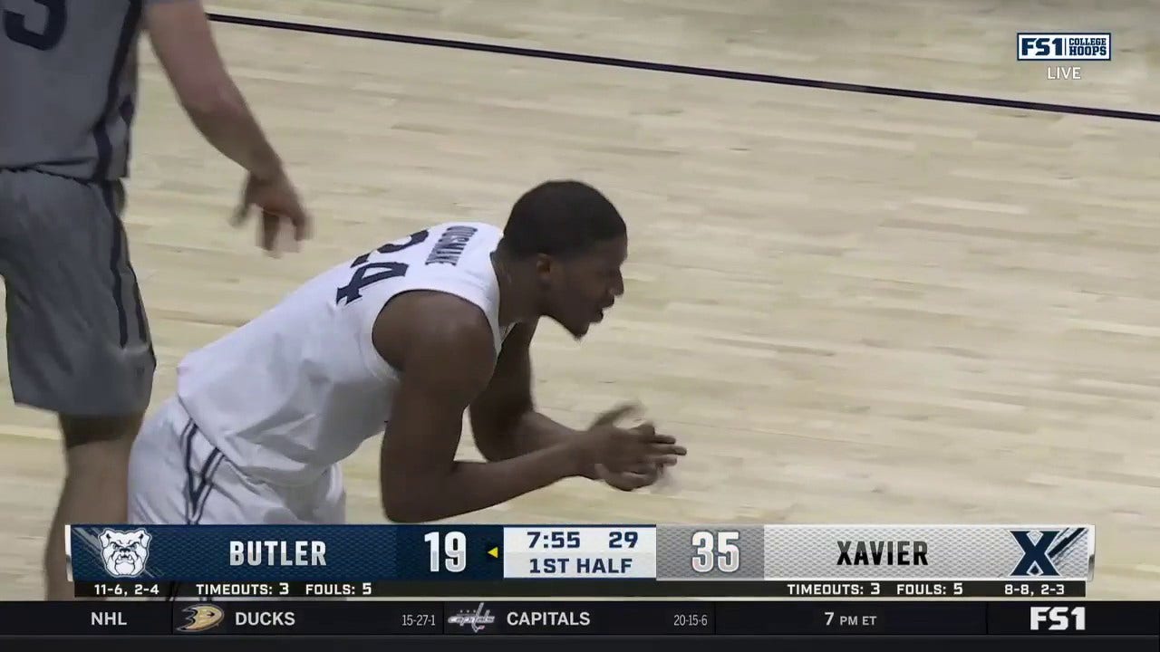 Xavier's Abou Ousmane hits a 3-pointer, capping off a 16-0 scoring run vs. Butler