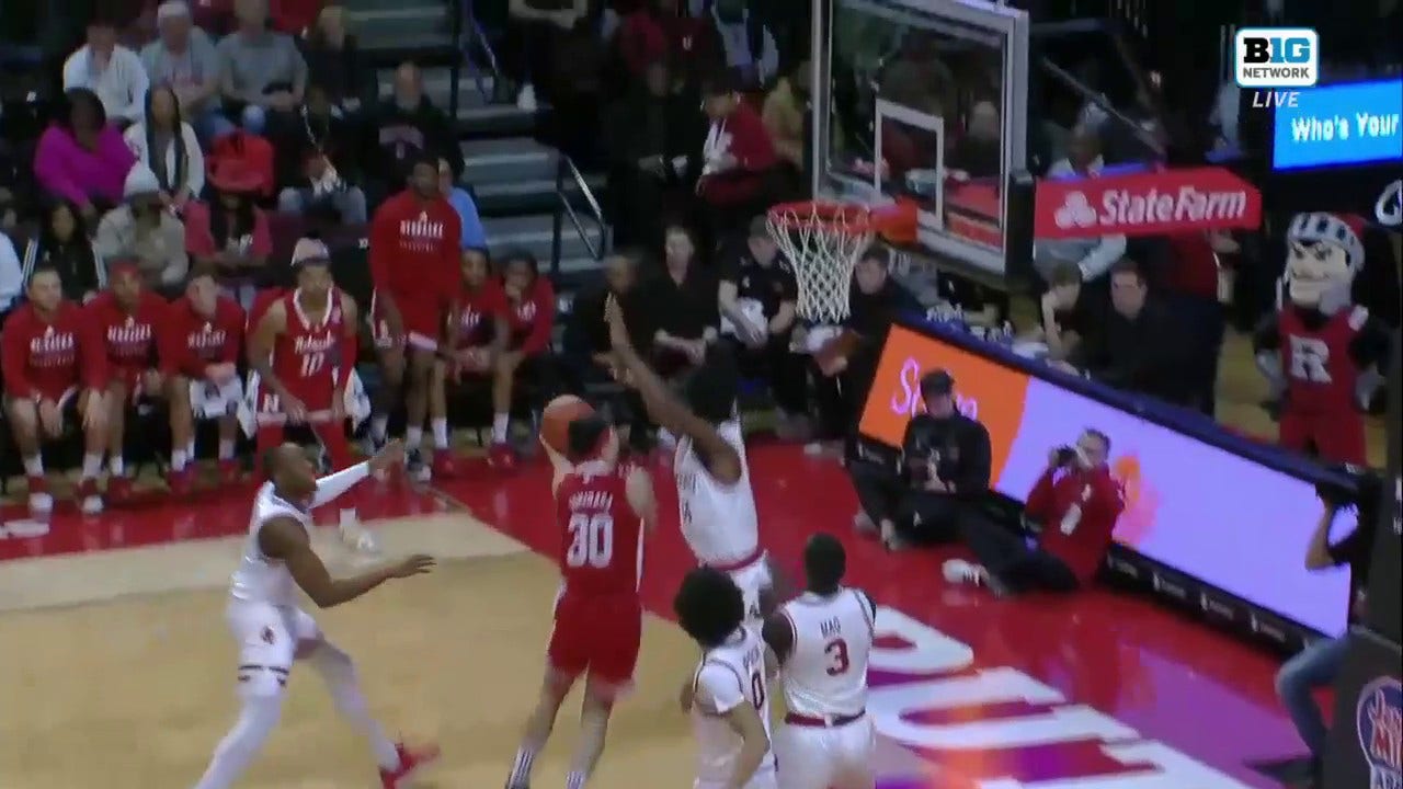 Nebraska's Keisei Tominaga finishes a tough reverse layup against Rutgers