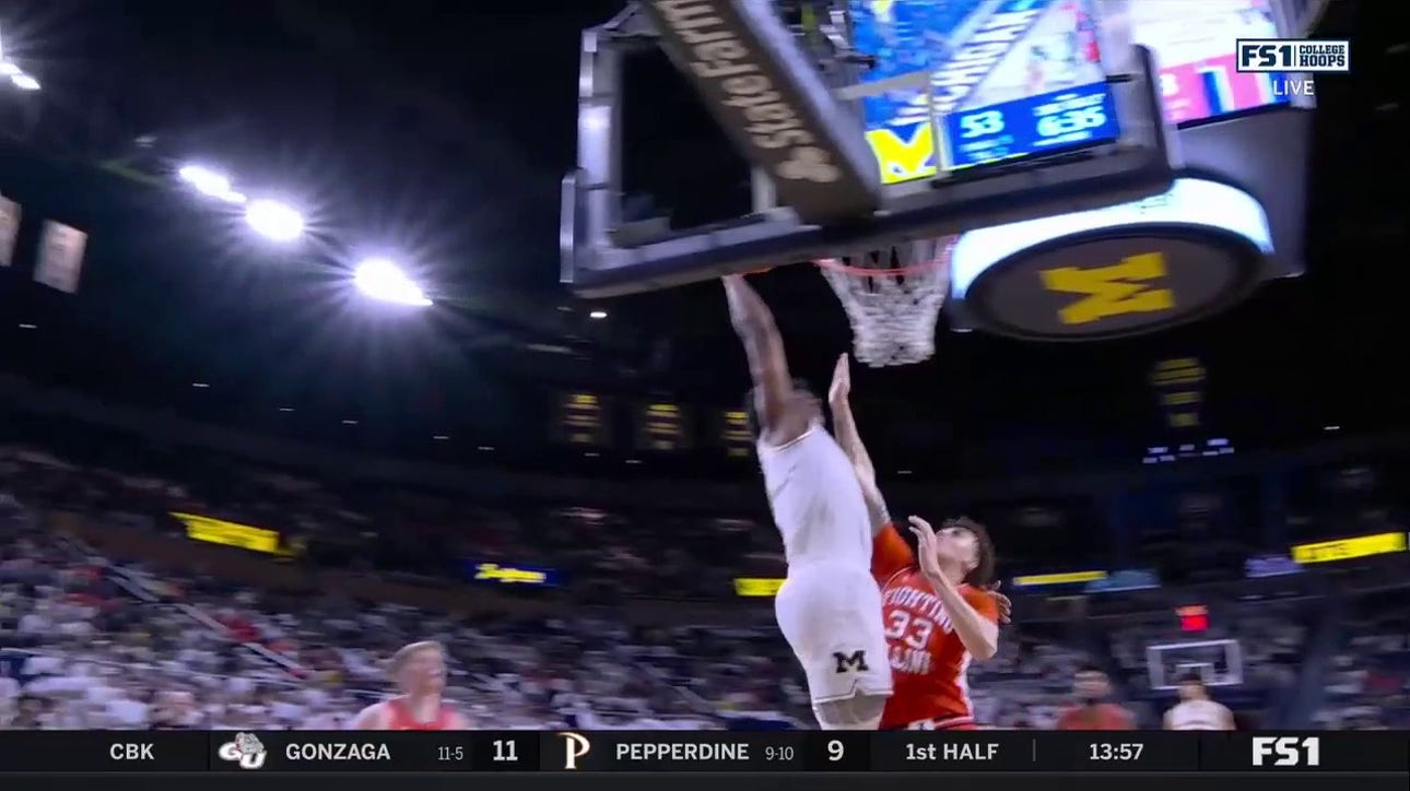 Michigan's Dug McDaniel finds Tarris Reed Jr. for the alley-oop dunk to close the gap with Illinois