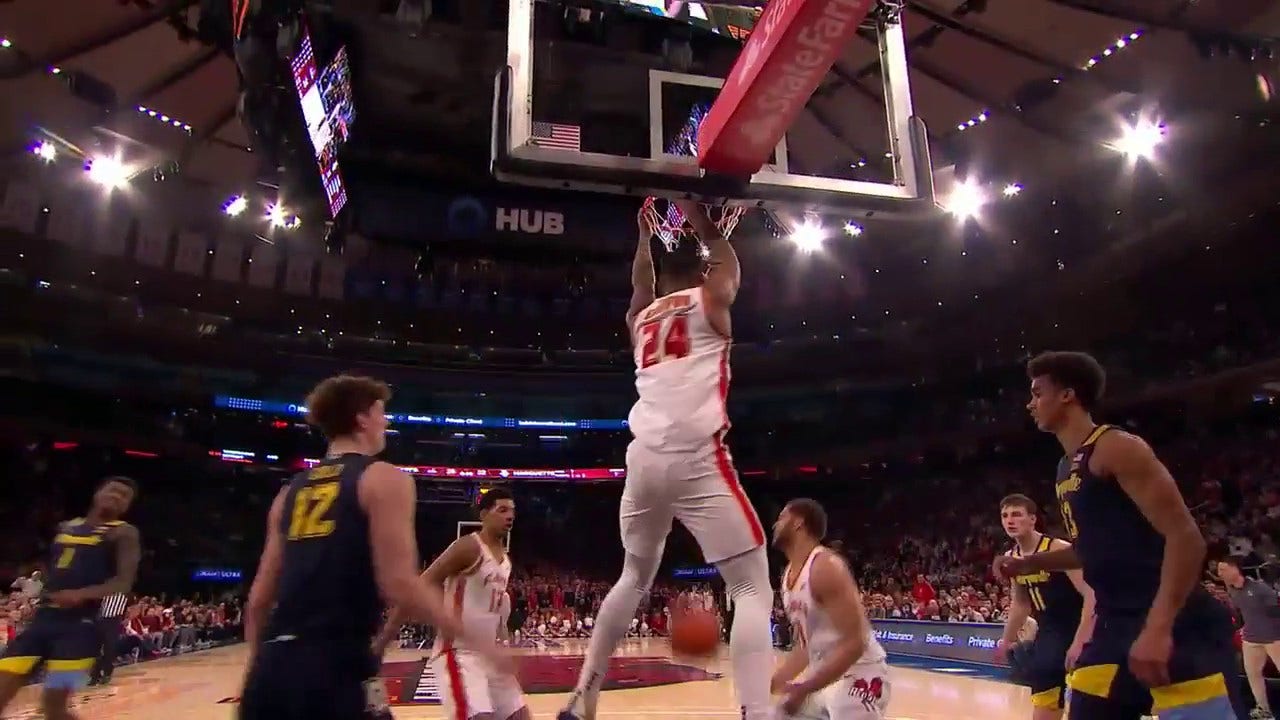 Zuby Ejiofor throws down a two-handed jam to extend St. John's lead over Marquette