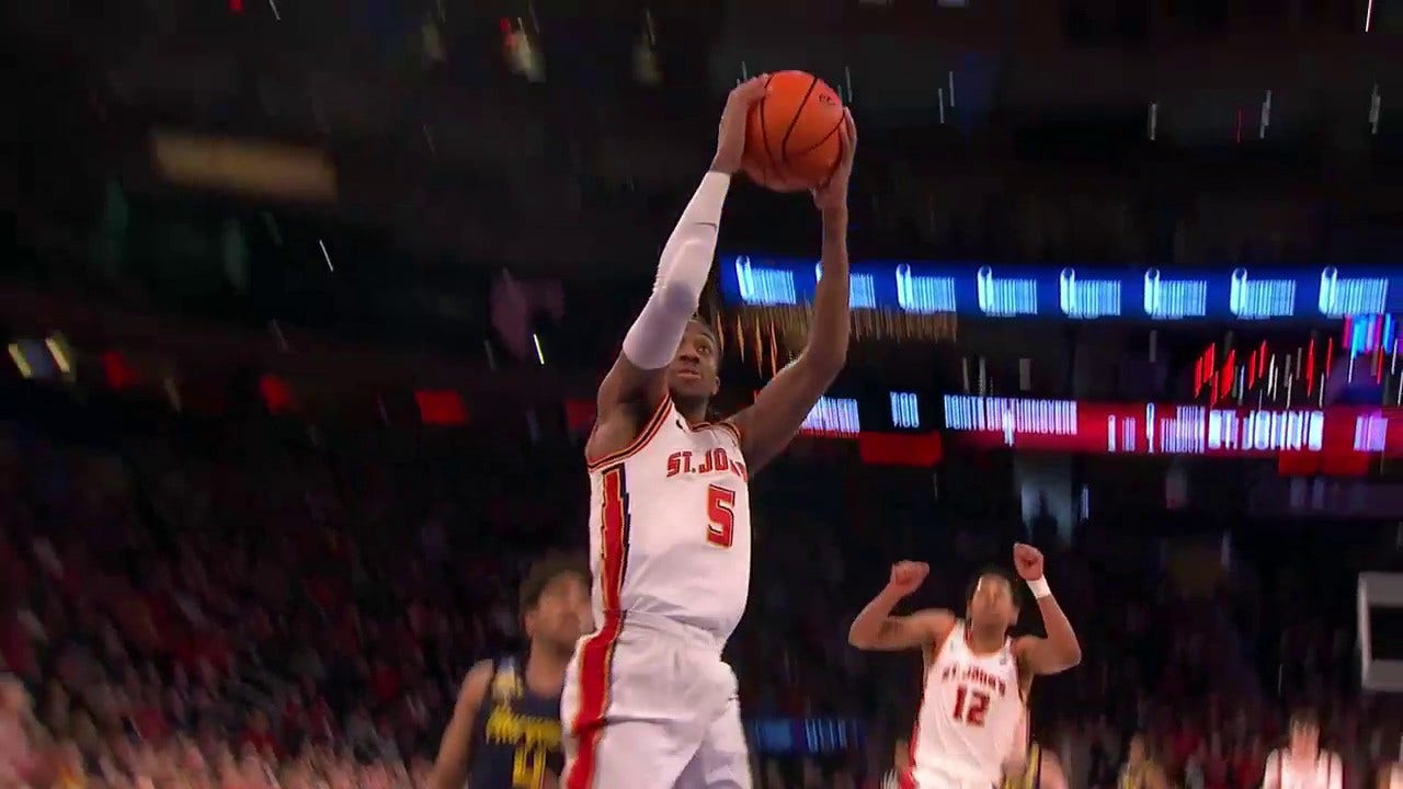 St. John's RJ Luis makes the steal and sets up a beautiful dunk by Daniss Jenkins
