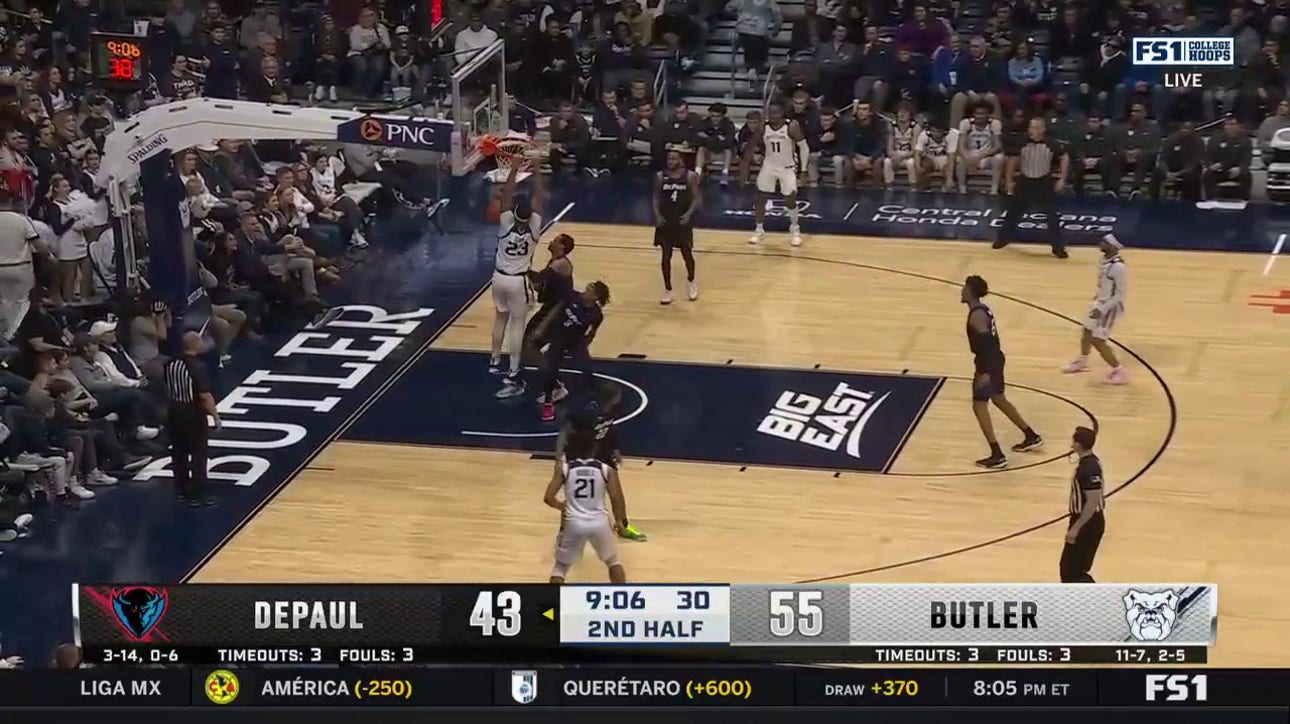Butler's Andre Screen throws down a slam dunk to increase the lead over DePaul