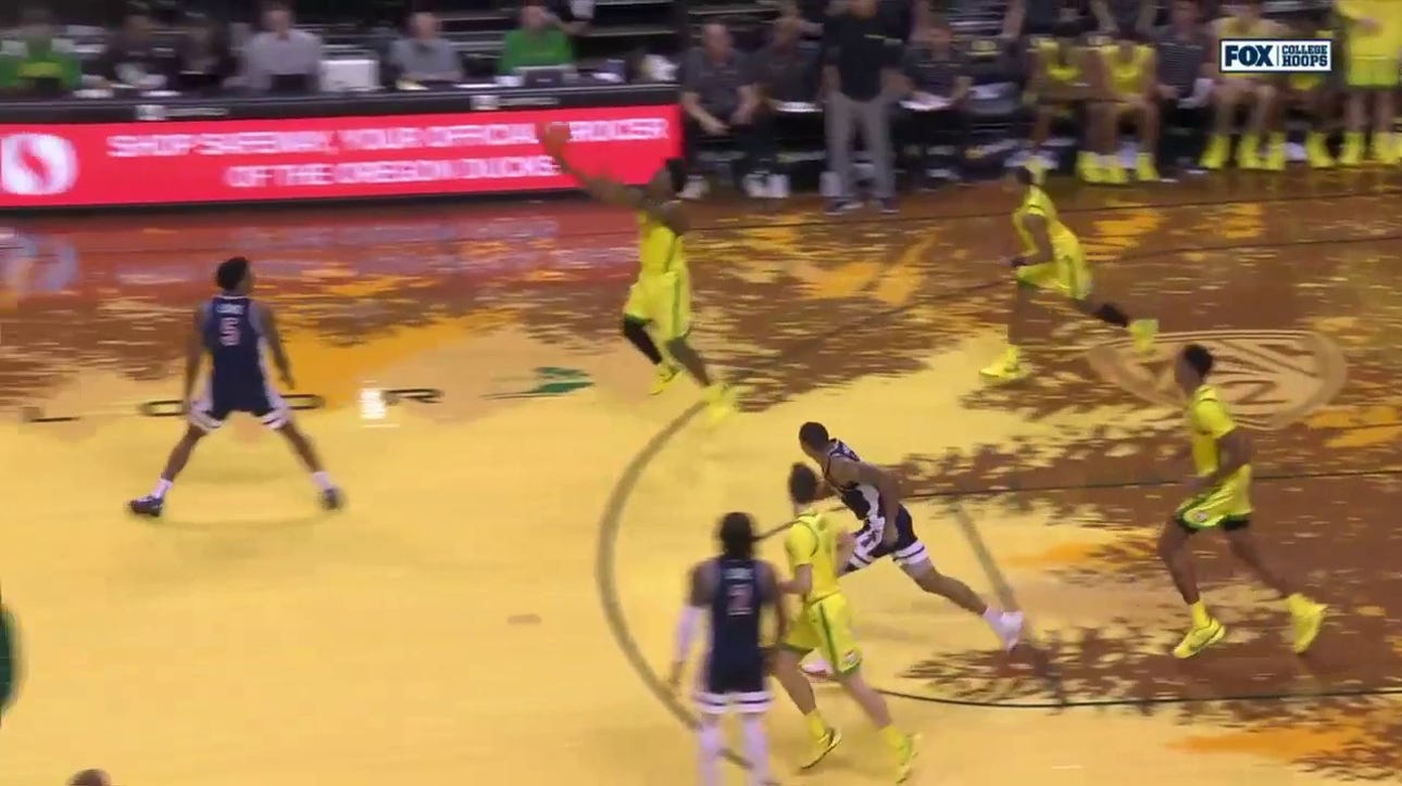 Oregon's Jermaine Couisnard knocks down a 3/4-court shot to close out the half vs. Arizona
