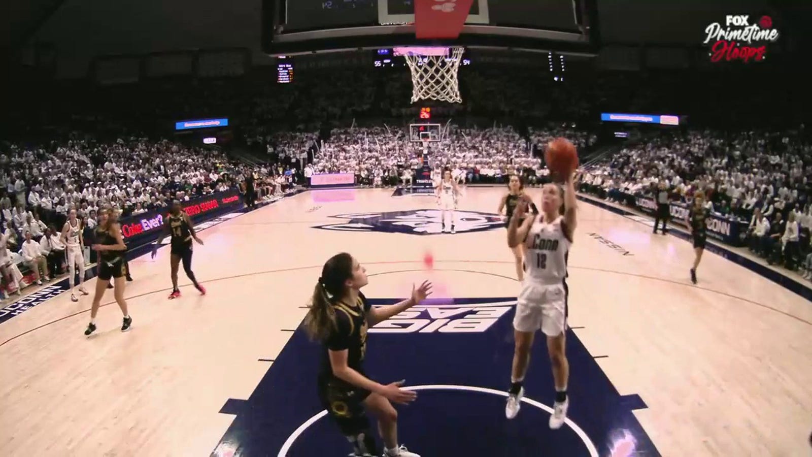 Ashlynn Shade makes a layup from KK Arnold's fast break to give UConn a lead over Notre Dame