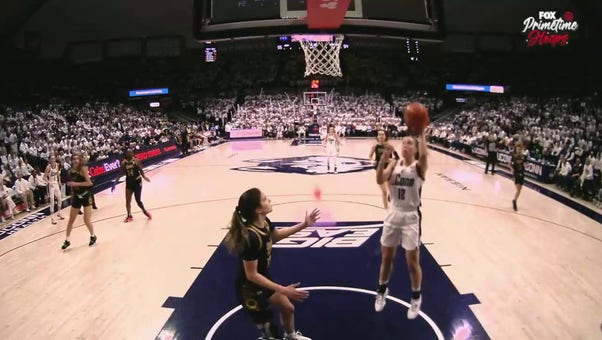 Ashlynn Shade makes a layup from KK Arnold's fast break to give UConn a lead over Notre Dame