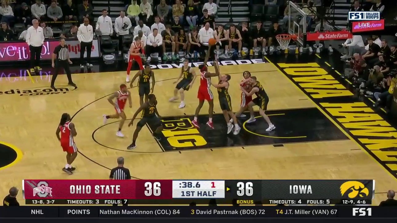 Felix Okpara scores late in the shot clock to give Ohio State a 38-36 lead over Iowa heading into halftime 