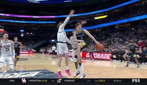 Tyler Kolek gets crafty with a no-look pass to David Joplin for a 3-pointer to extend Marquette's lead over Georgetown