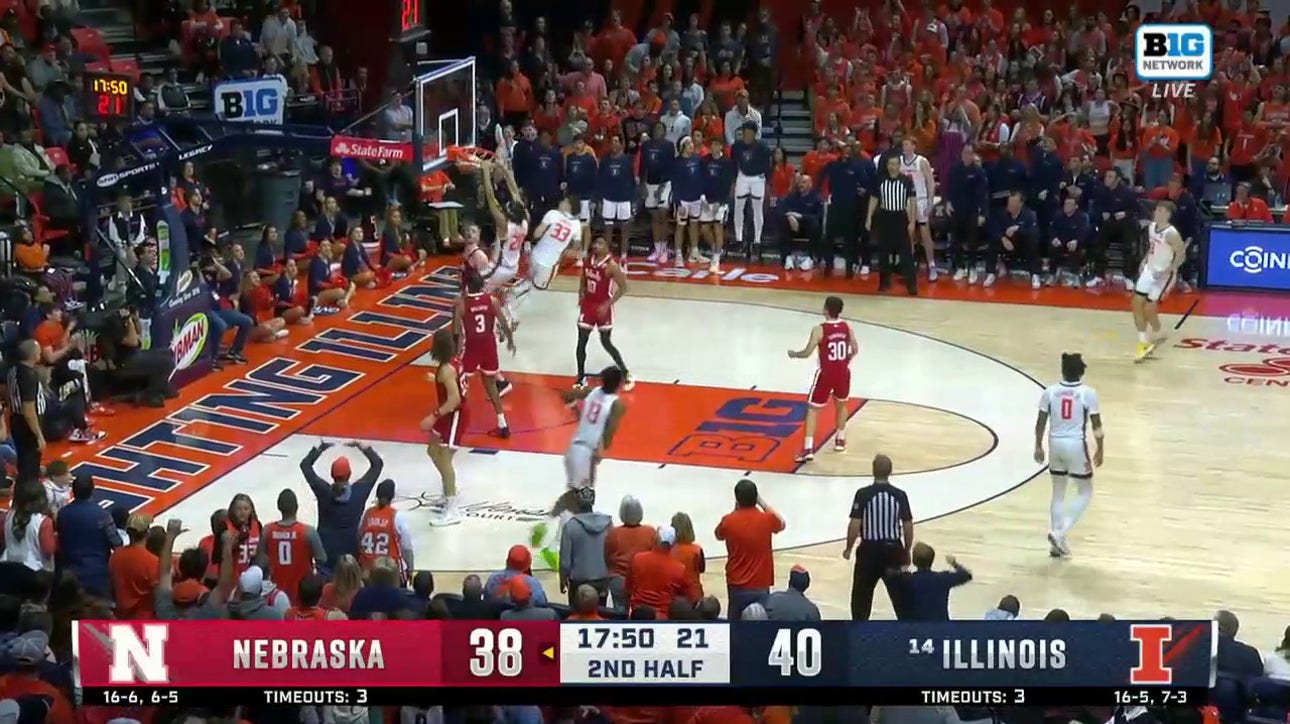 Illinois' Ty Rodgers makes the two-handed slam to increase the lead over Nebraska