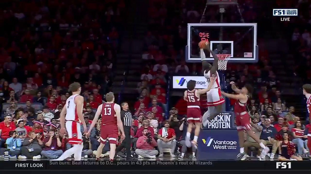 Arizona's Caleb Love finds Oumar Ballo for a MONSTER two-handed alley-oop over Stanford