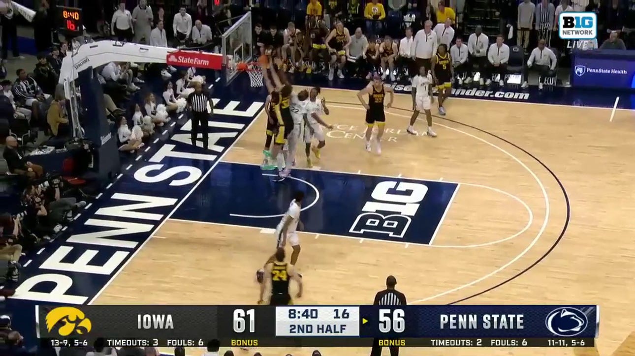 Owen Freeman rises for the two-handed poster to extend Iowa's lead over Penn State