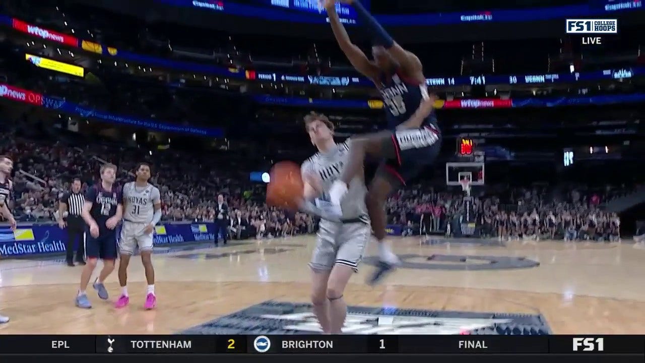 Samson Johnson throws down an alley-oop off an inbounds play, extending UConn's lead vs. Georgetown