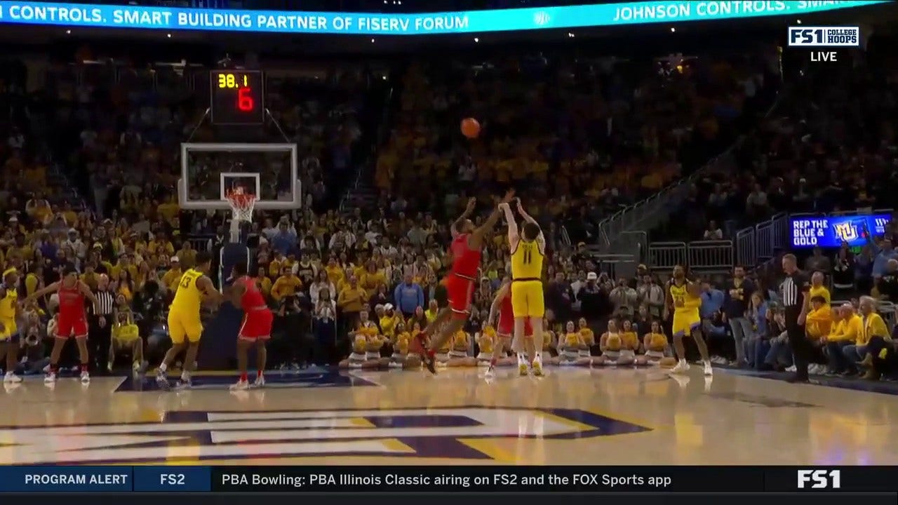 Tyler Kolek drills a 3-point dagger to seal No. 7 Marquette's 86-75 victory over St. John's
