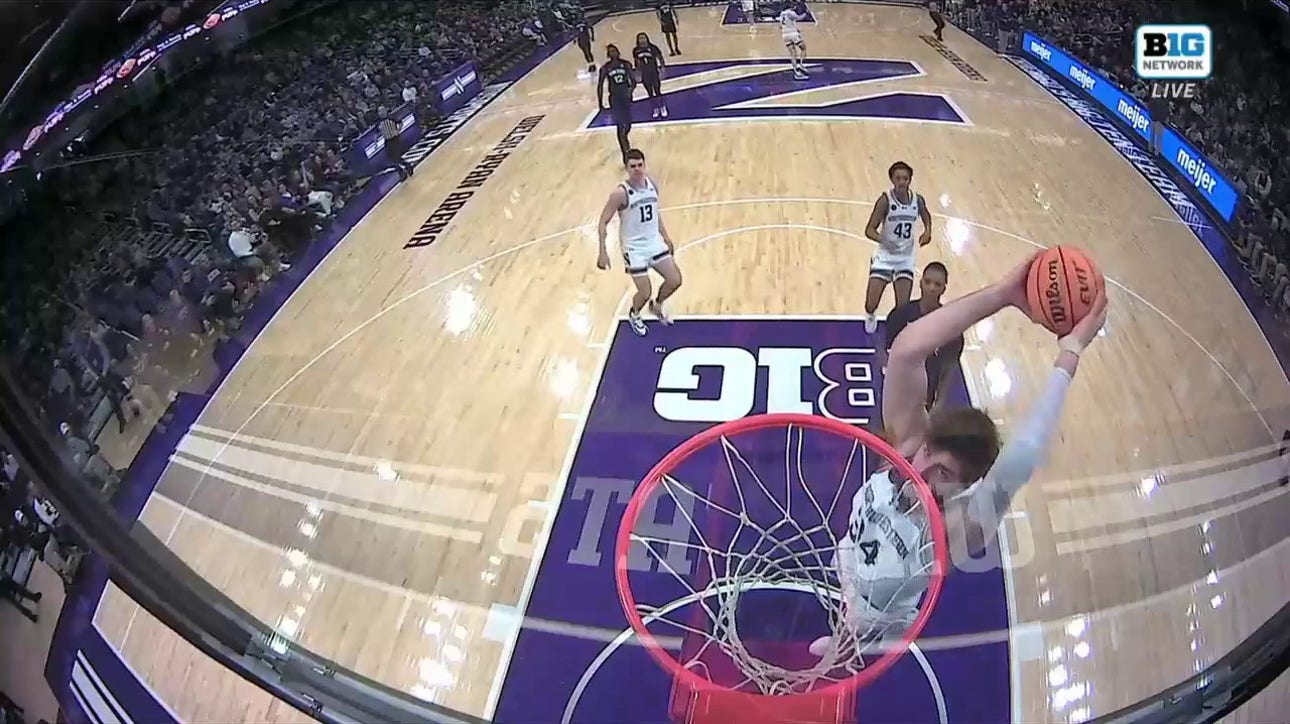 Northwestern's Matthew Nicholson throws down the huge two-handed dunk to extend the lead over Penn State