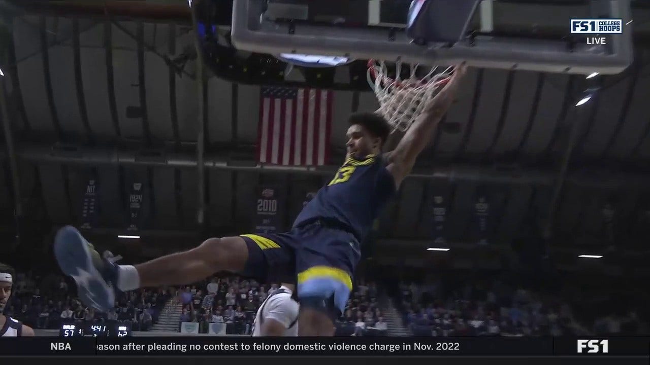 Oso Ighodaro throws down a dirty dunk, extending Marquette's lead vs. Butler