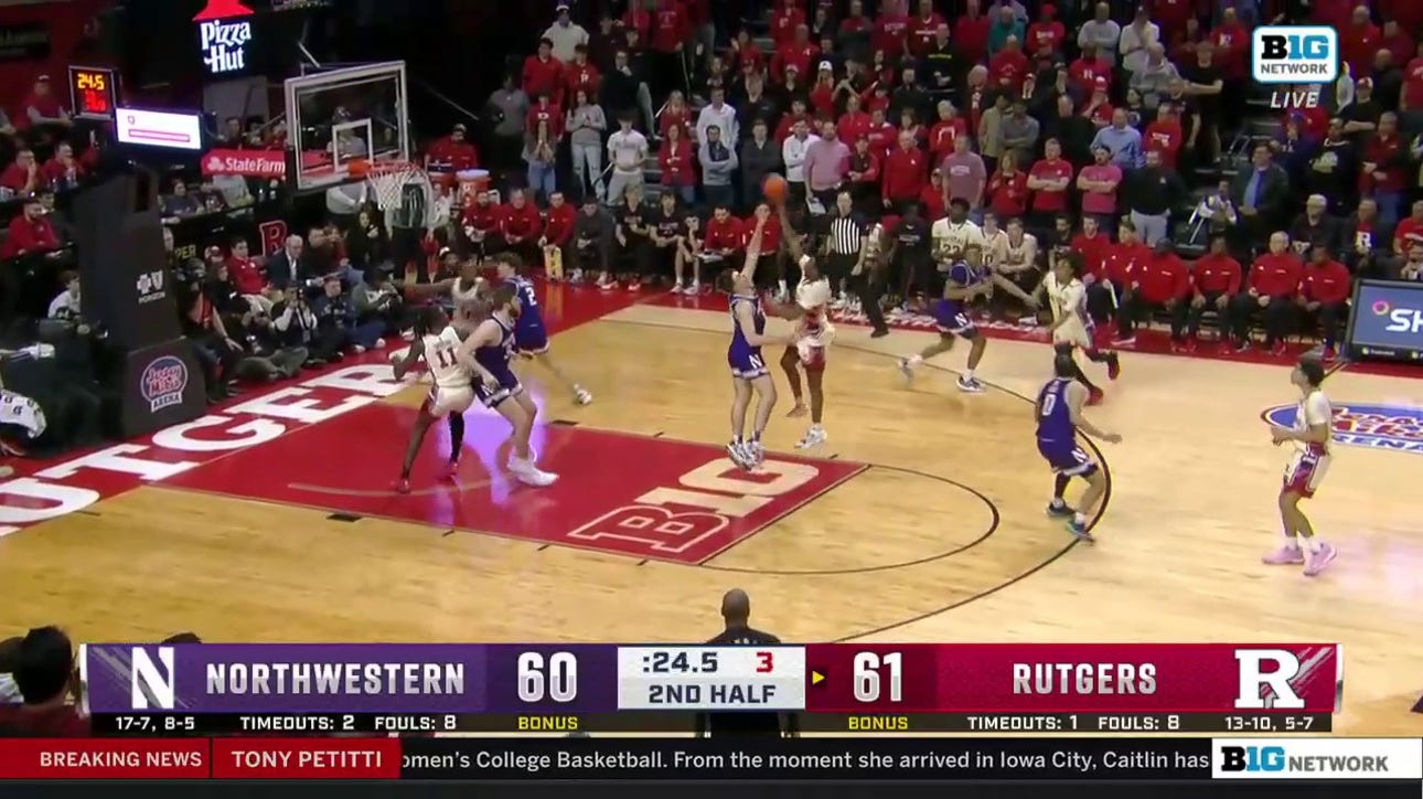 Rutgers' Jeremiah Williams sinks a tough floater to ice the game against Northwestern