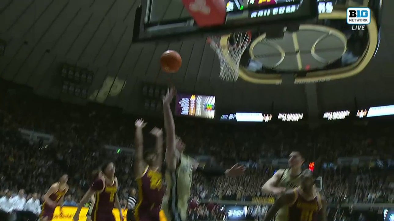 Braden Smith absorbs contact and finishes a strong and-1 layup that seals No. 2 Purdue's 84-76 victory over Minnesota