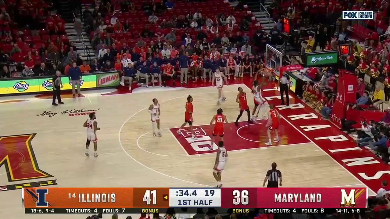 Maryland's Julian Reese throws down the two-handed jam to cut Illinois' lead