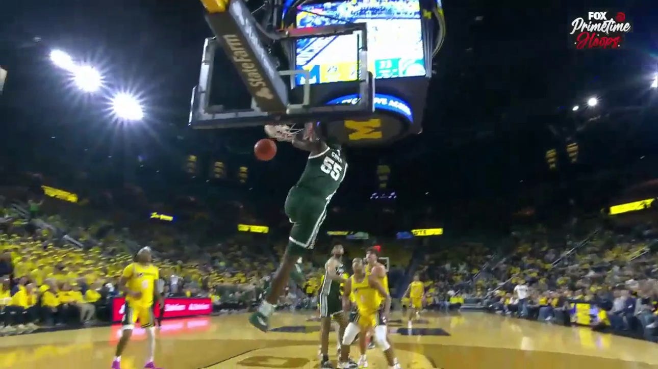 Tyson Walker finds Coen Carr for the alley-oop to extend Michigan State's lead over Michigan
