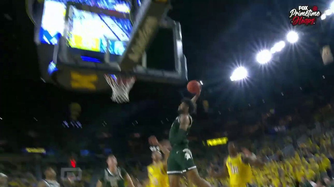 Michigan State's Malik Hall throws down a monster one-handed dunk to extend the lead against Michigan
