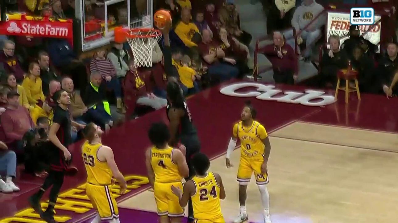 Rutgers' Clifford Omoruyi throws down the one-handed jam to take the lead against Minnesota