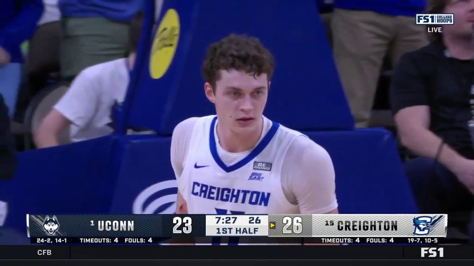 Creighton's Ryan Kalkbrenner records a block and follows with a dunk on the other end vs. UConn