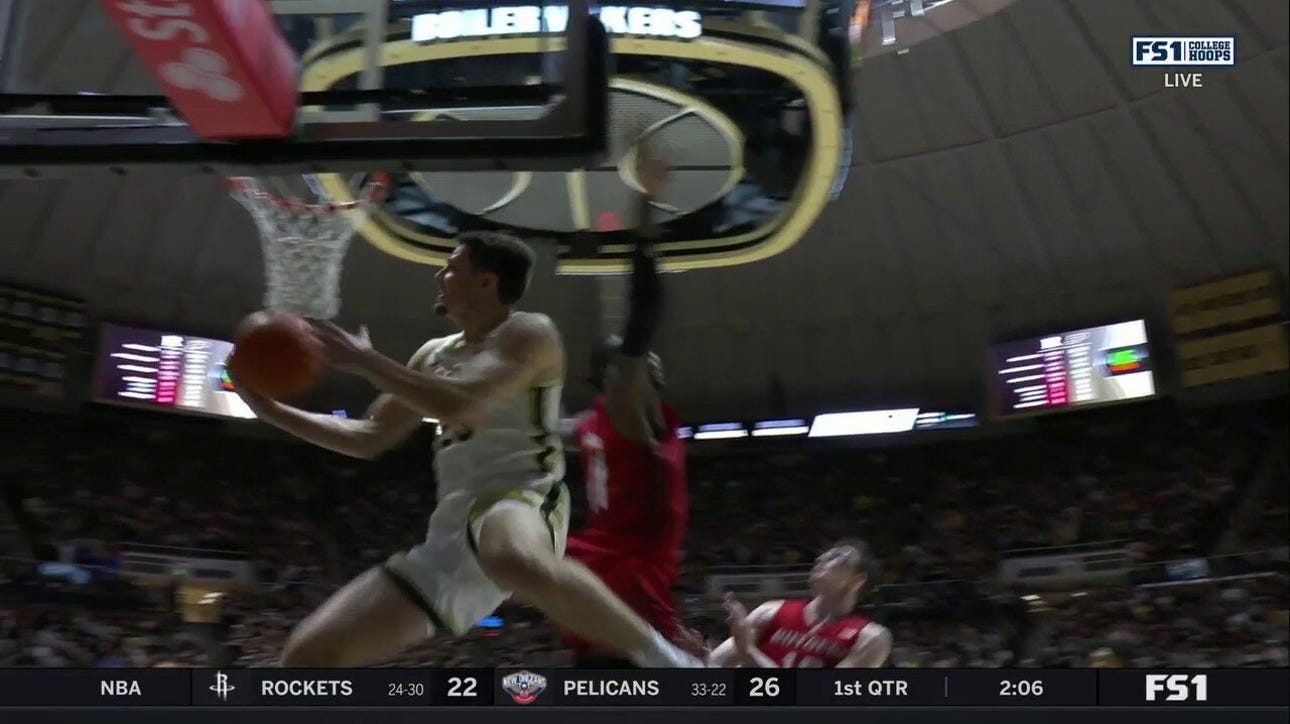 Camden Heide goes baseline for a SICK reverse layup to extend Purdue's lead over Rutgers