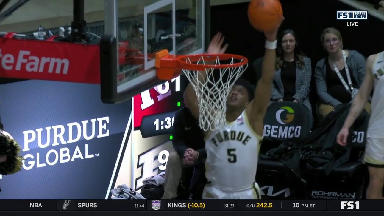 Myles Colvin skies for the one-handed putback dunk to seal Purdue's 96-68 victory over Rutgers