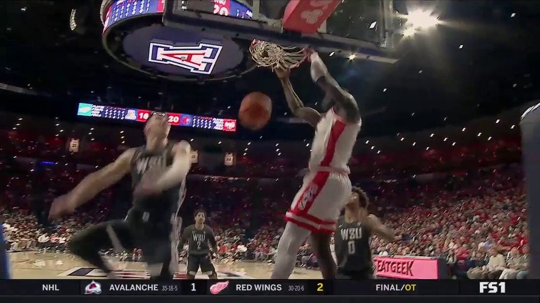 Arizona's Pelle Larsson connects with Oumar Ballo on the alley-oop vs. Washington St