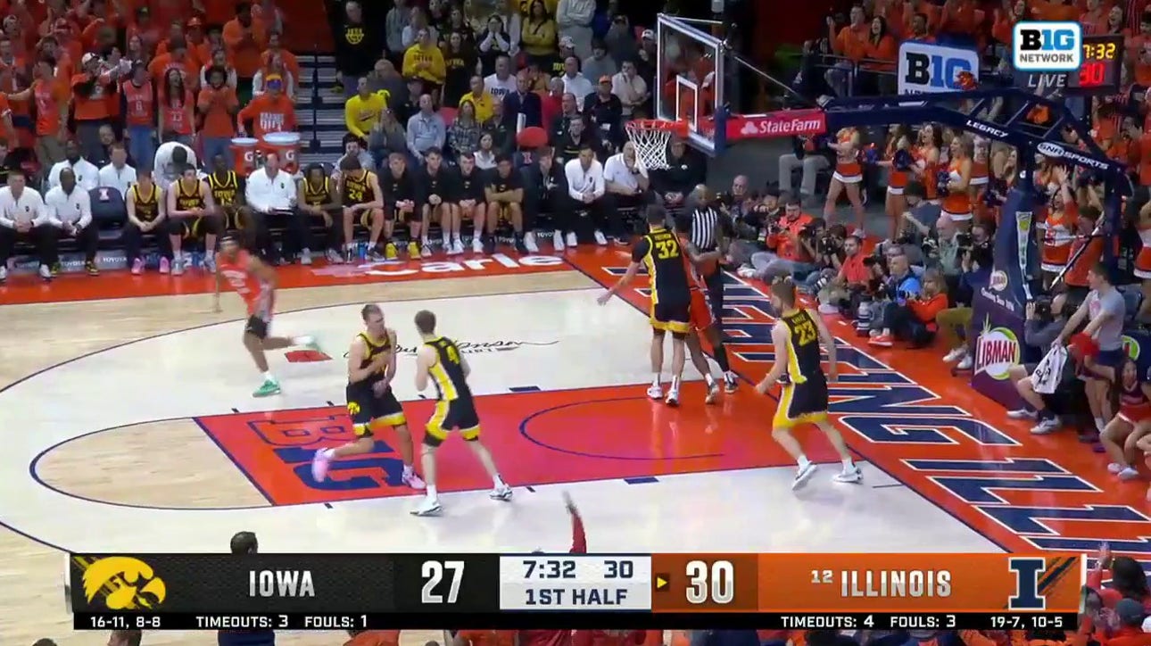 Quincy Guerrier soars for the two-handed alley-oop to extend Illinois' lead over Iowa