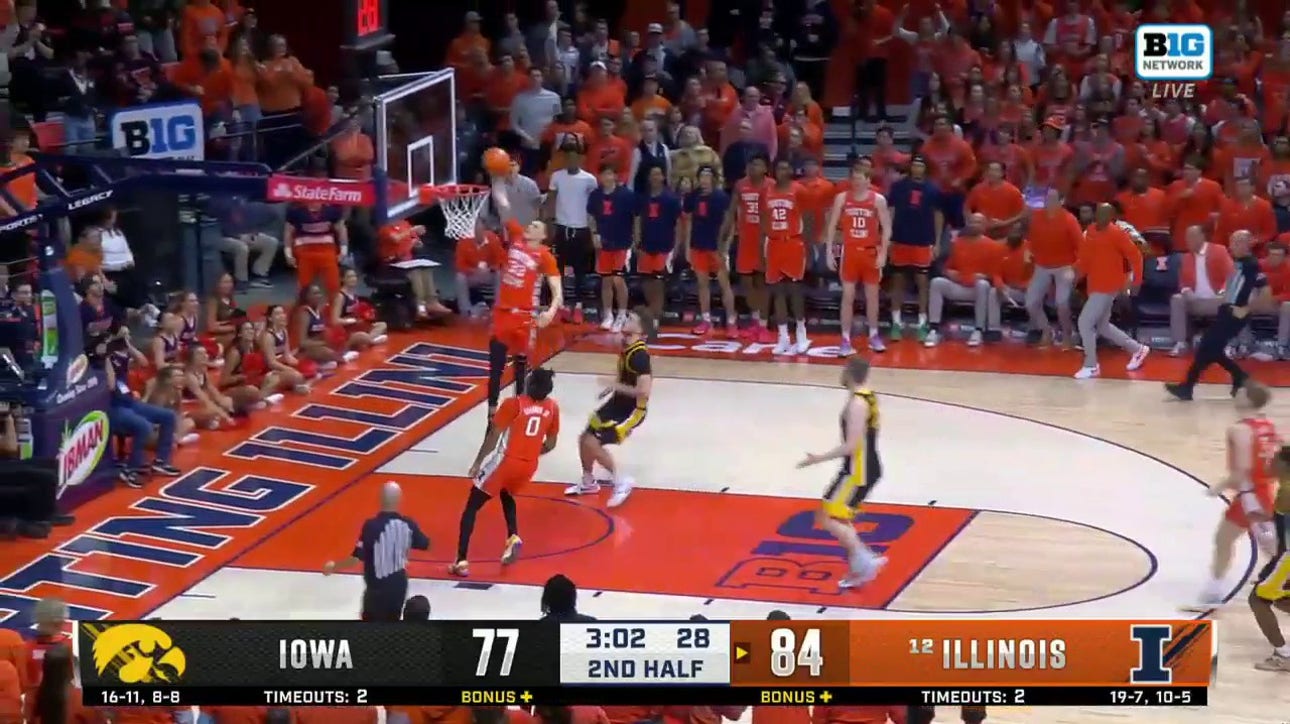 Illinois' Coleman Hawkins steals the ball and slams down a fast-break to seal win over Iowa