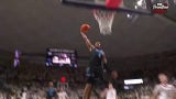 Villanova's Mark Armstrong throws down a one-handed dunk to close the gap against UConn