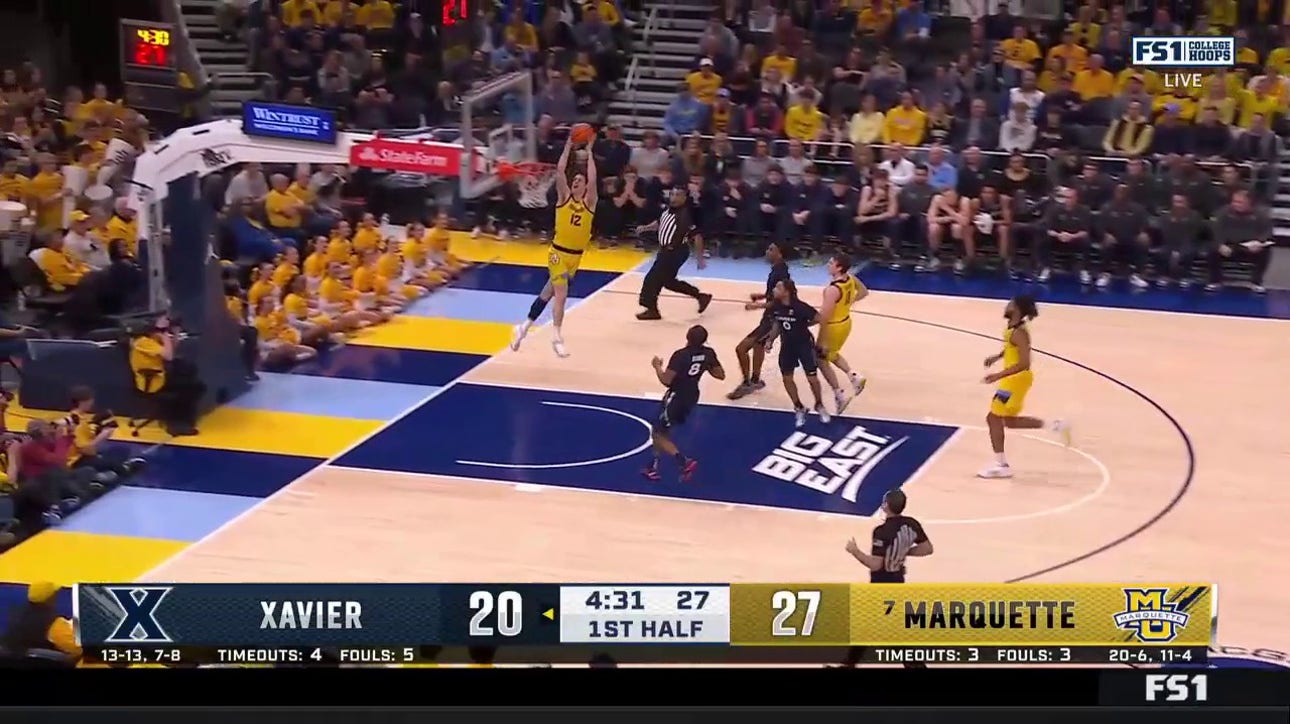 Tyler Kolek finds Ben Gold for a strong two-handed alley-oop to extend Marquette's lead over Xavier