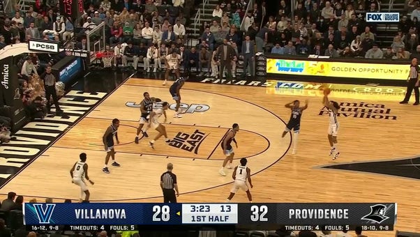 Providence's Devin Carter splashes a logo 3-pointer to push the lead against Villanova