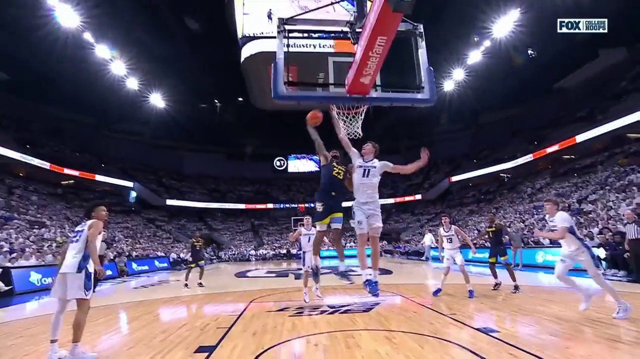 Marquette's David Joplin with a NASTY poster to even the score against Creighton