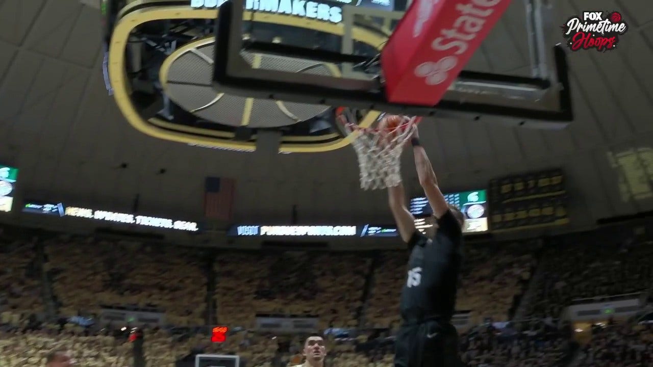 Tyson Walker connects with Carson Cooper for a WILD alley-oop jam as Michigan State trims deficit vs. Purdue