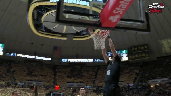 Tyson Walker connects with Carson Cooper for a WILD alley-oop jam as Michigan State trims deficit vs. Purdue