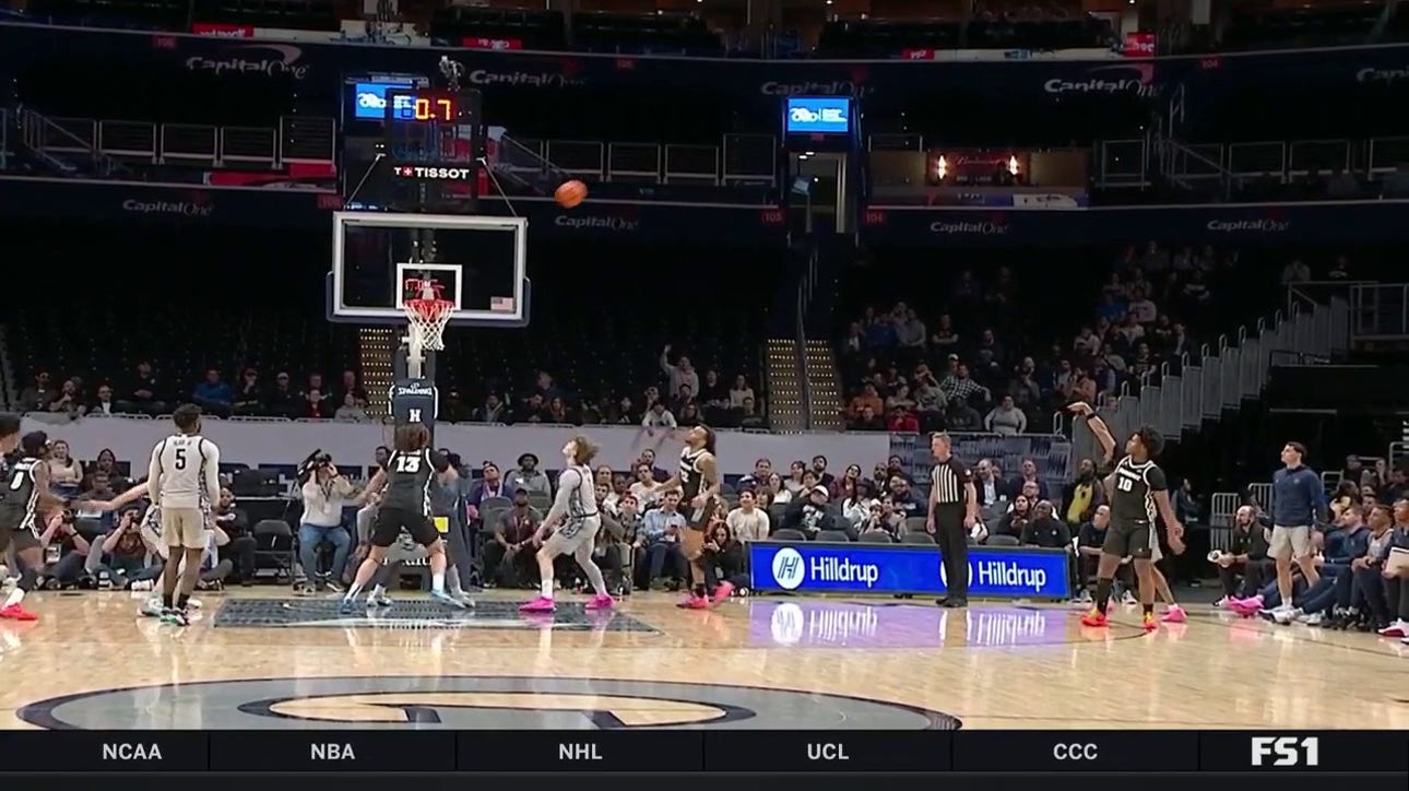 Providence's Rich Barron drills a buzzer-beating 3-pointer to end the first half with a 30-26 lead vs. Georgetown