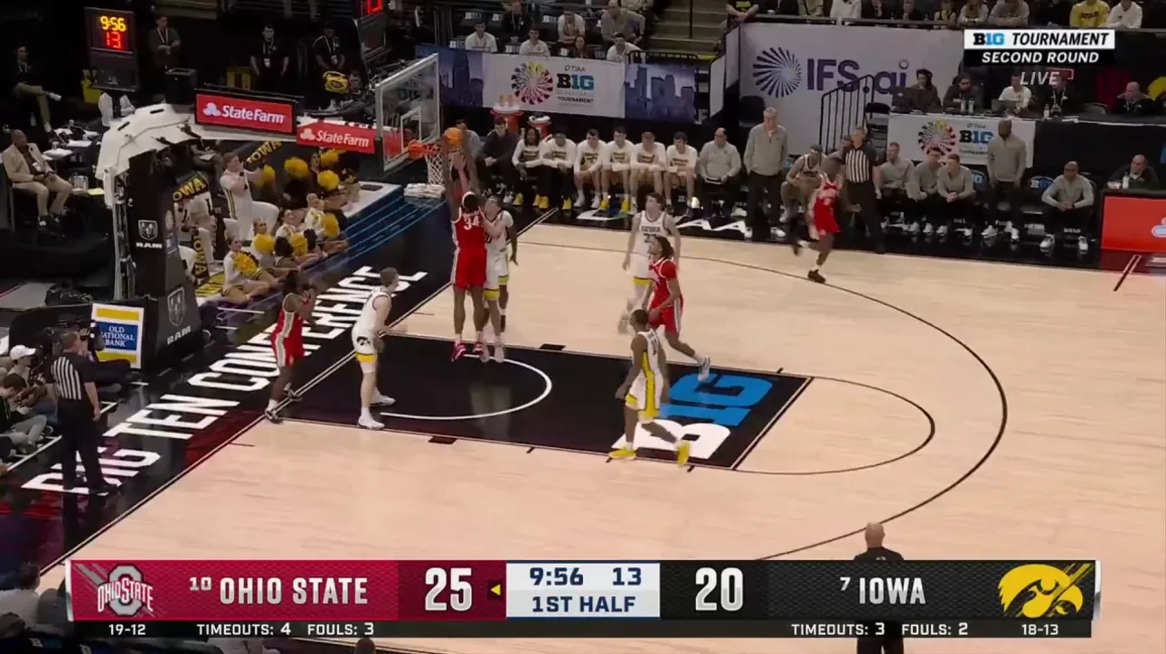 Felix Okpara rises for a strong two-handed slam to extend Ohio State's lead over Iowa