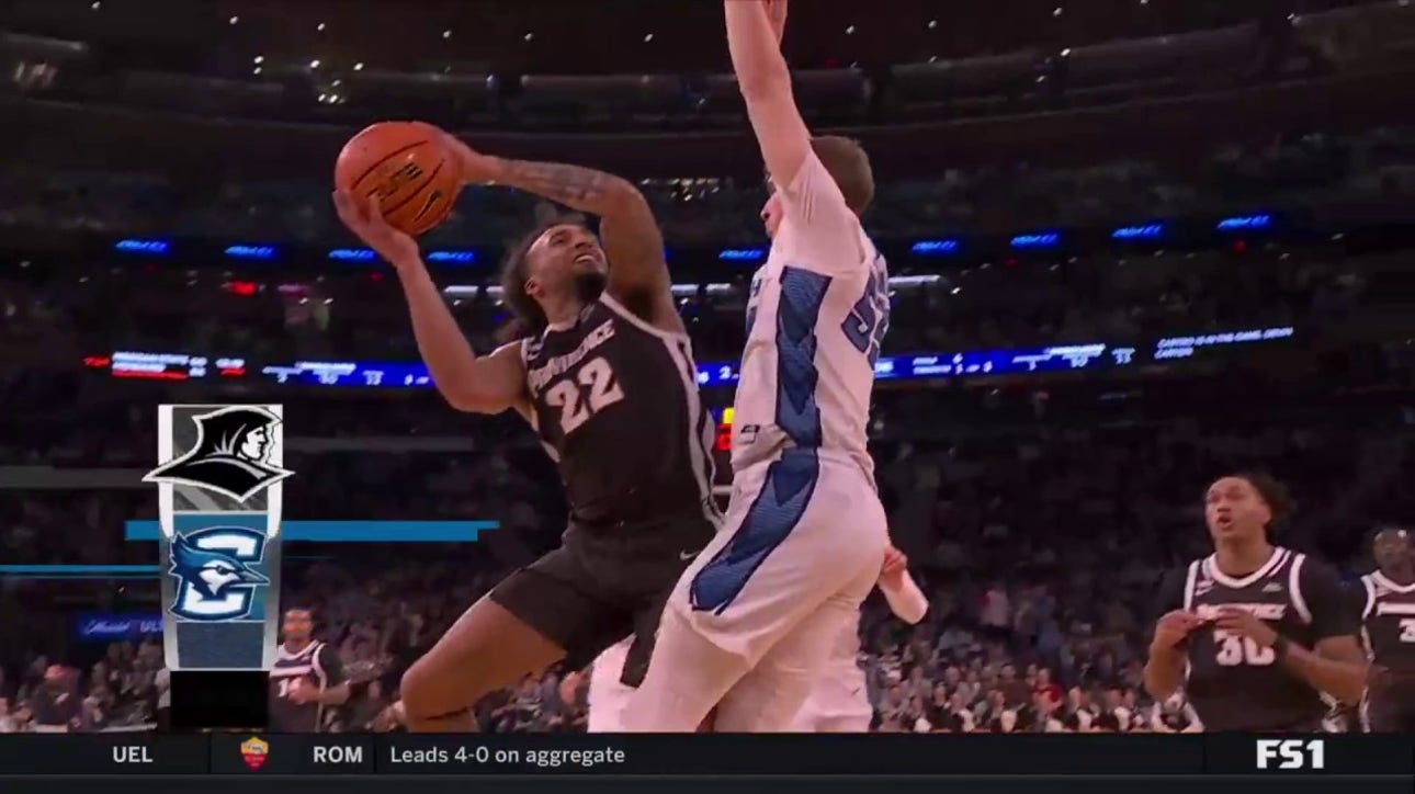 Devin Carter takes it all the way for a crafty layup to extend Providence's lead over Creighton