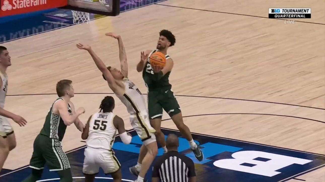Michigan State's Malik Hall finishes with a spin move, plus a foul to trim Purdue's lead